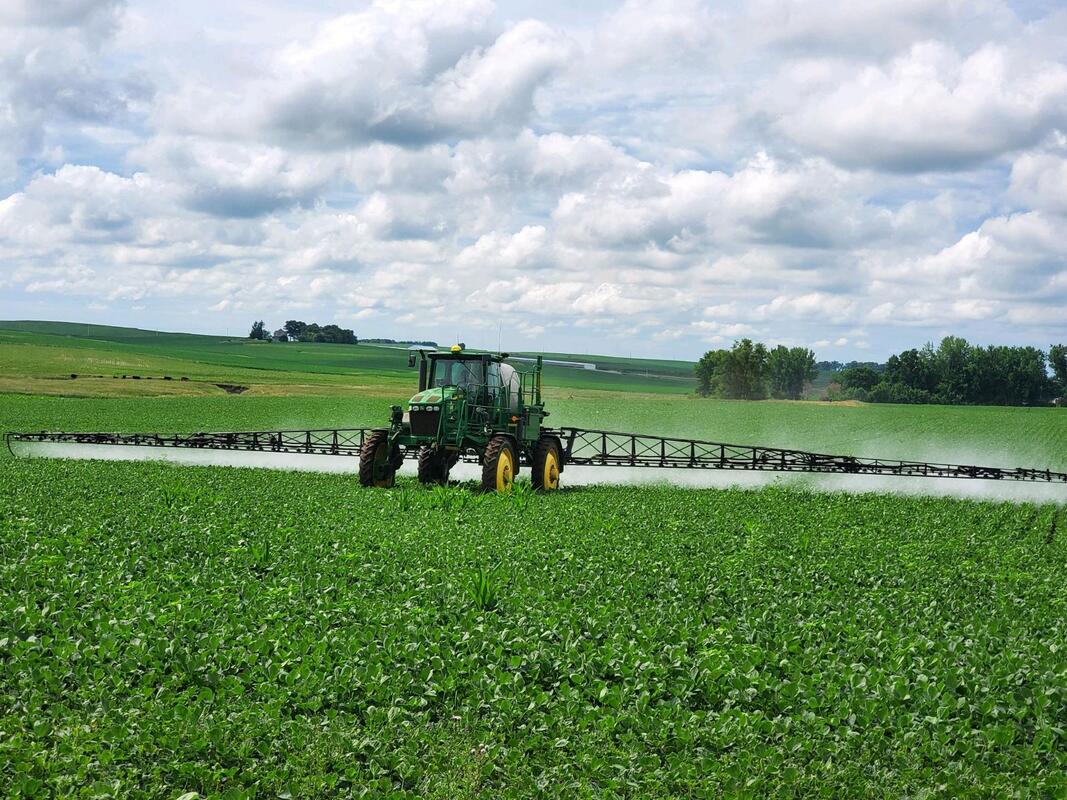 Our agricultural chemicals being applied to a field